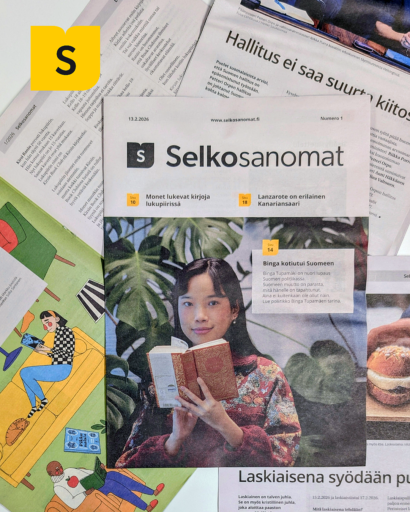 Valokuvassa näkyy Selkosanomien vuoden 2026 ensimmäisen numeron kansi. Kuvassa on myös samaa lehteä avattuna, jolloin näkyy Suomi-sivu ja Teema-aukeama.